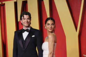 John Mulaney and Olivia Munn arrive at Vanity Fair's Oscars party after the Academy Awards, in Beverly Hills, California, on March 10, 2024.